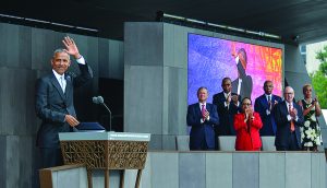 President Barack Obama waves to the crowd during the grand opening ceremony for the National Museum of African American History and Culture on the National Mall in Washington, D.C. (Freddie Allen/AMG/NNPA)