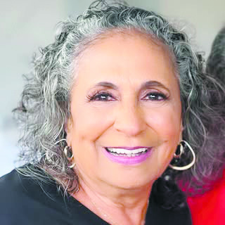 Cathy Hughes